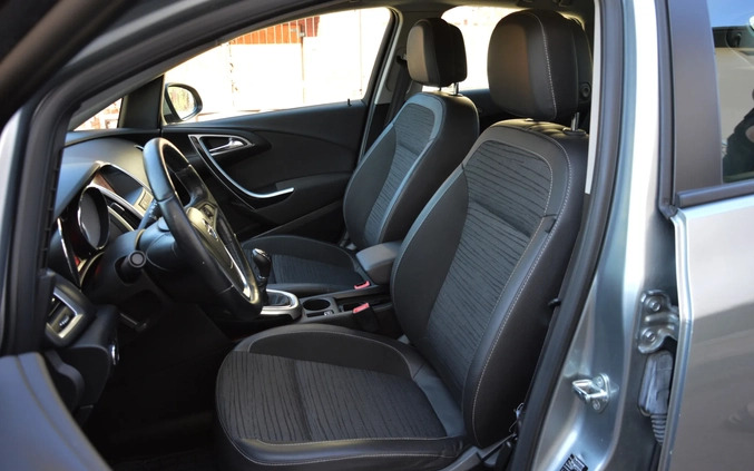 Opel Astra cena 32900 przebieg: 180000, rok produkcji 2014 z Płock małe 562